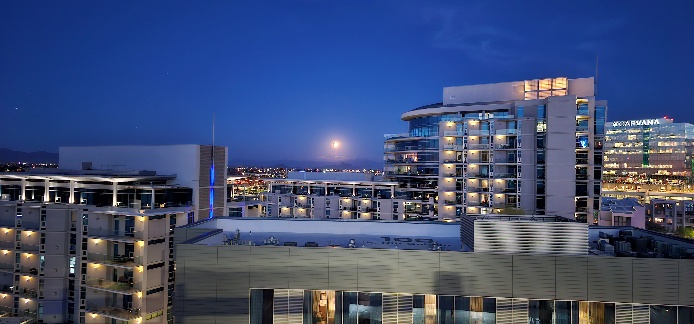 City skyline at dusk representing commercial security clients